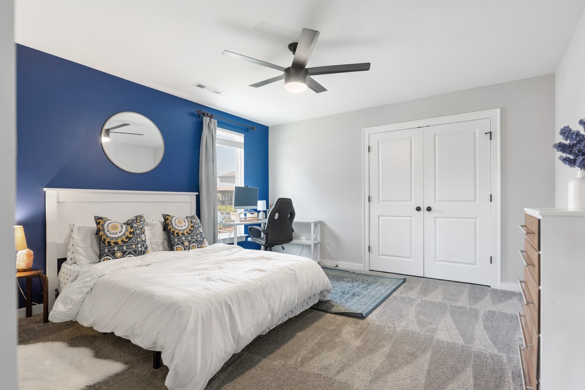 883 Plowson Road Mount Juliet, TN 37122 - Photo 40 of 47 a bedroom with a bed and a closet