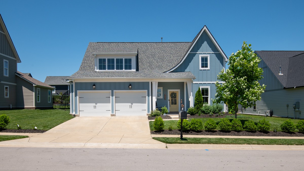 883 Plowson Road Mount Juliet, TN 37122 - Photo 5 of 47 a front view of a house with a yard
