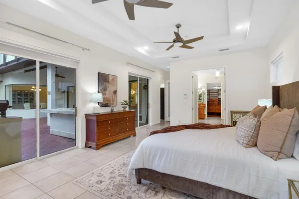 a view of a dining room with furniture wooden floor and chandelier