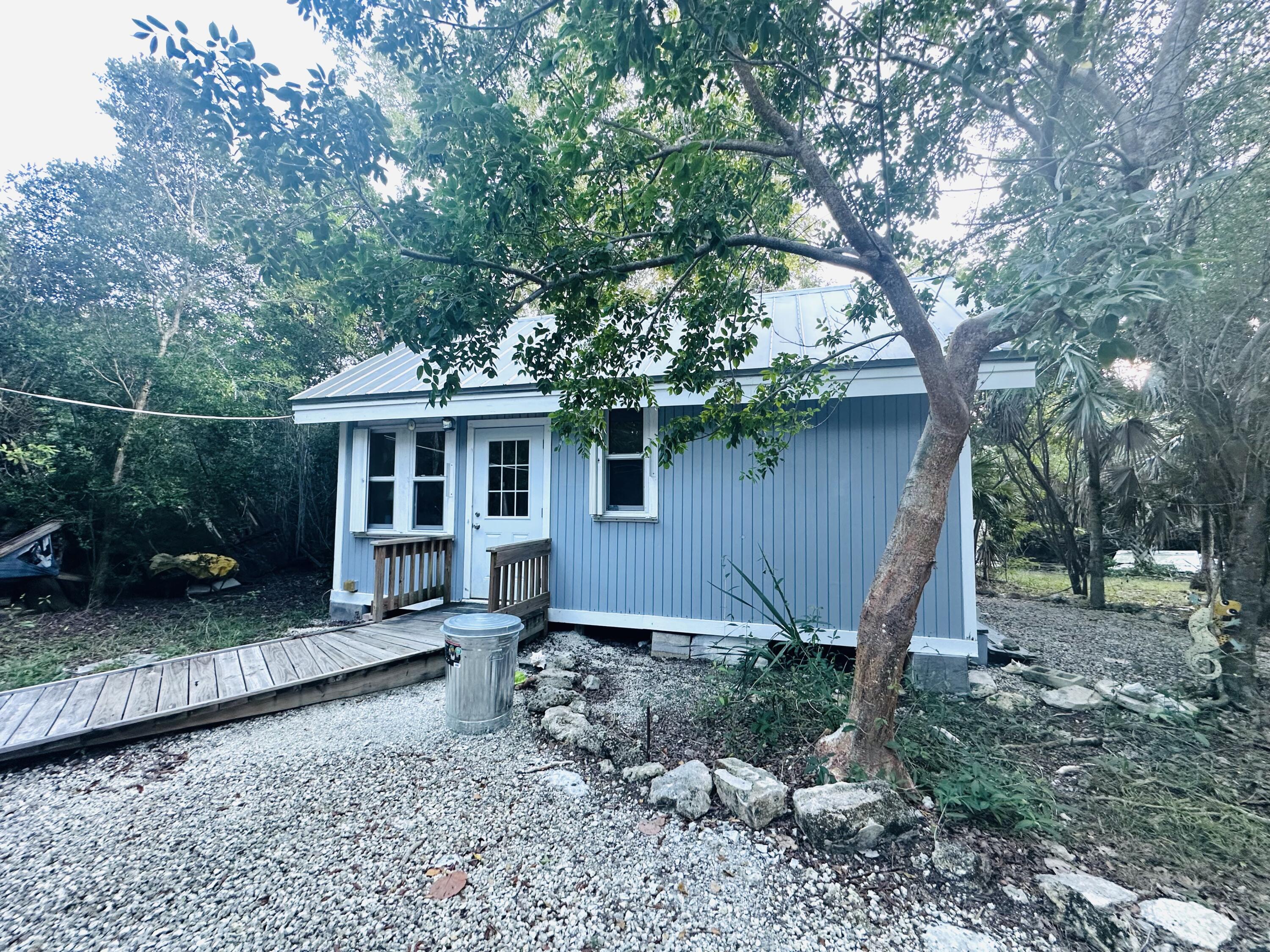 21857 Disturbed Pine Road Cudjoe, FL 33042 - Photo 1 of 30 Front of House