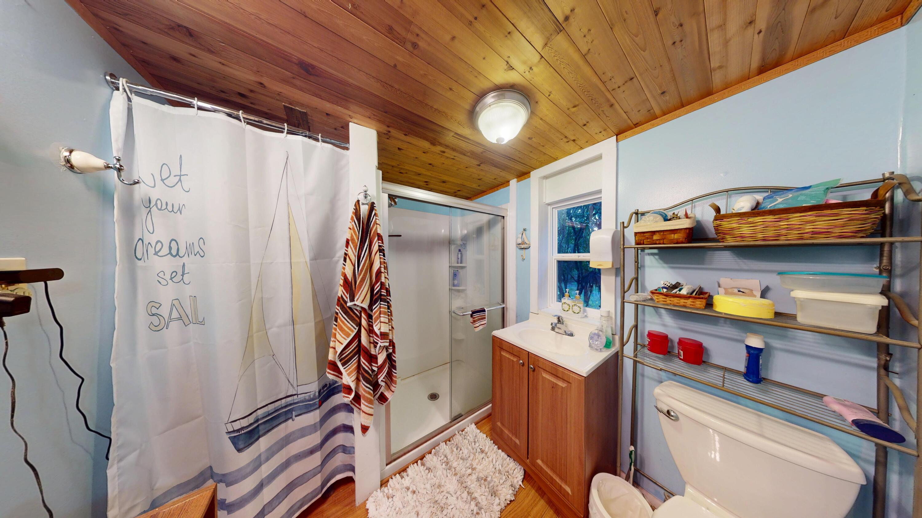 21857 Disturbed Pine Road Cudjoe, FL 33042 - Photo 24 of 30 a room with storage and utility