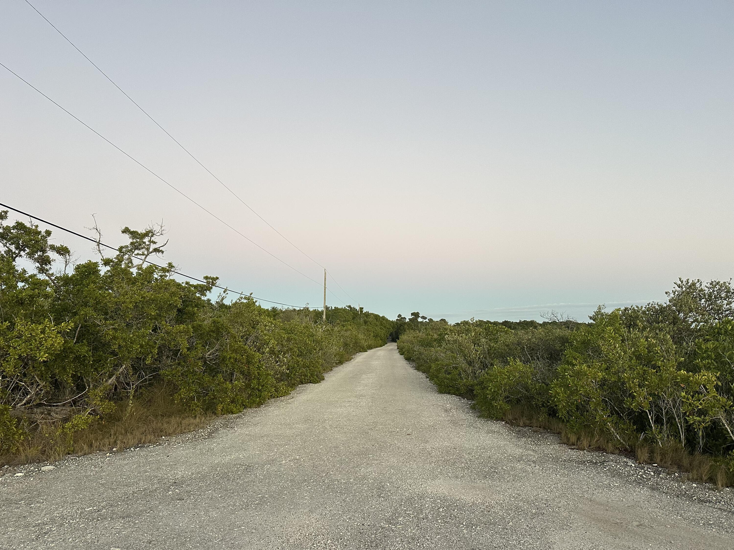 21857 Disturbed Pine Road Cudjoe, FL 33042 - Photo 26 of 31 a view of a city
