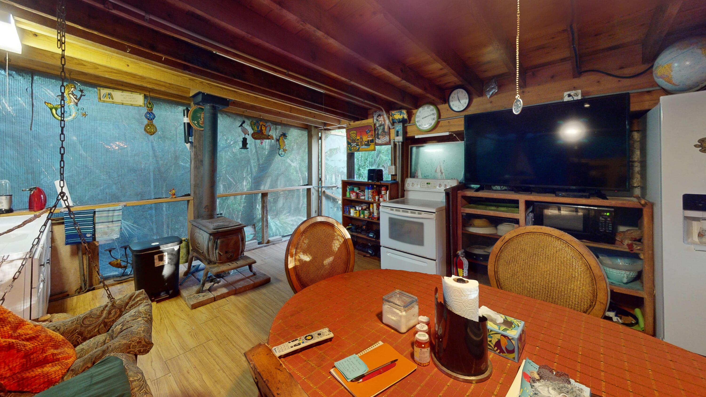 21857 Disturbed Pine Road Cudjoe, FL 33042 - Photo 7 of 31 a outdoor space with furniture