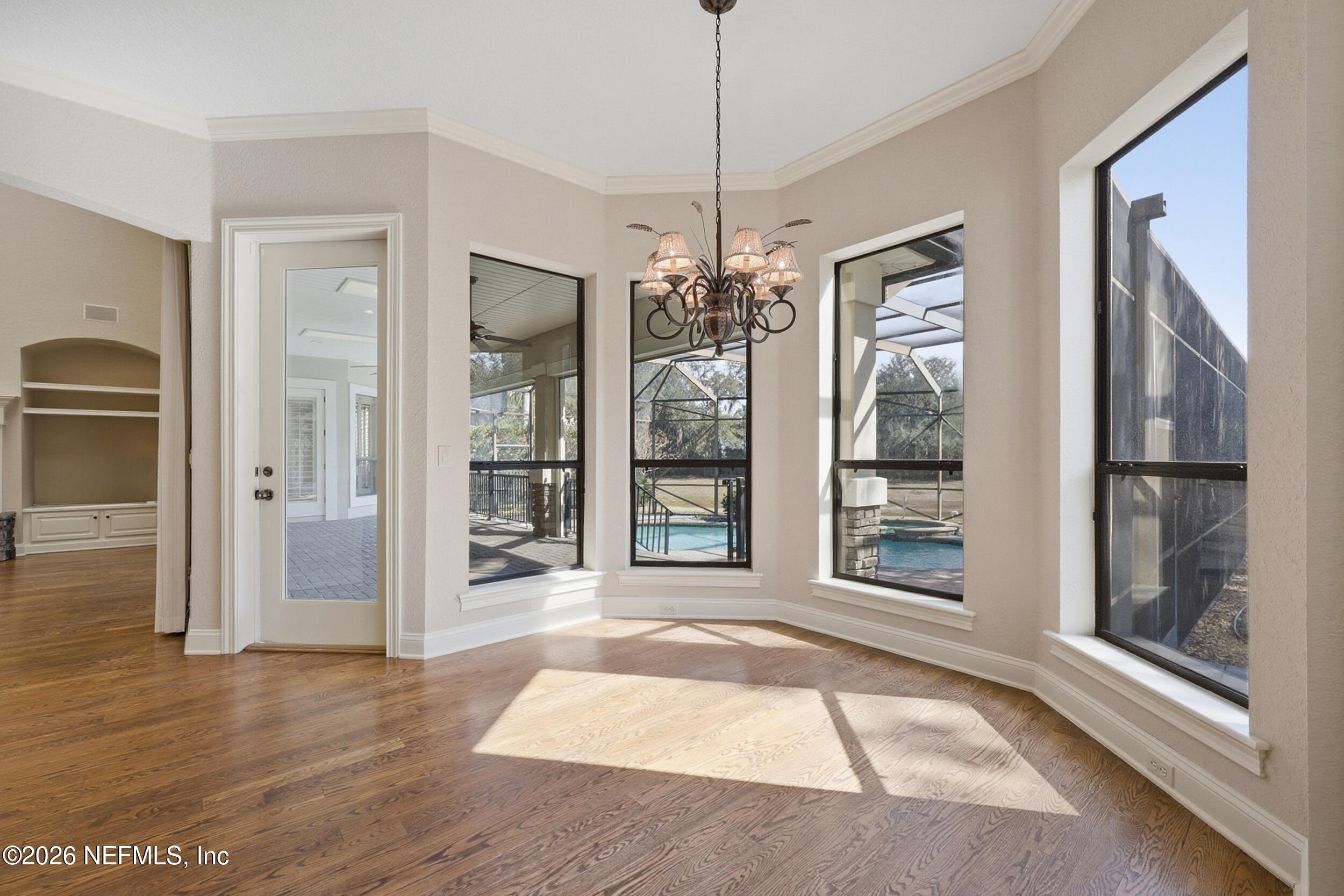 661 Treehouse Circle St. Augustine, FL 32095 - Photo 14 of 89 Dining Nook w/ Door to Lanai