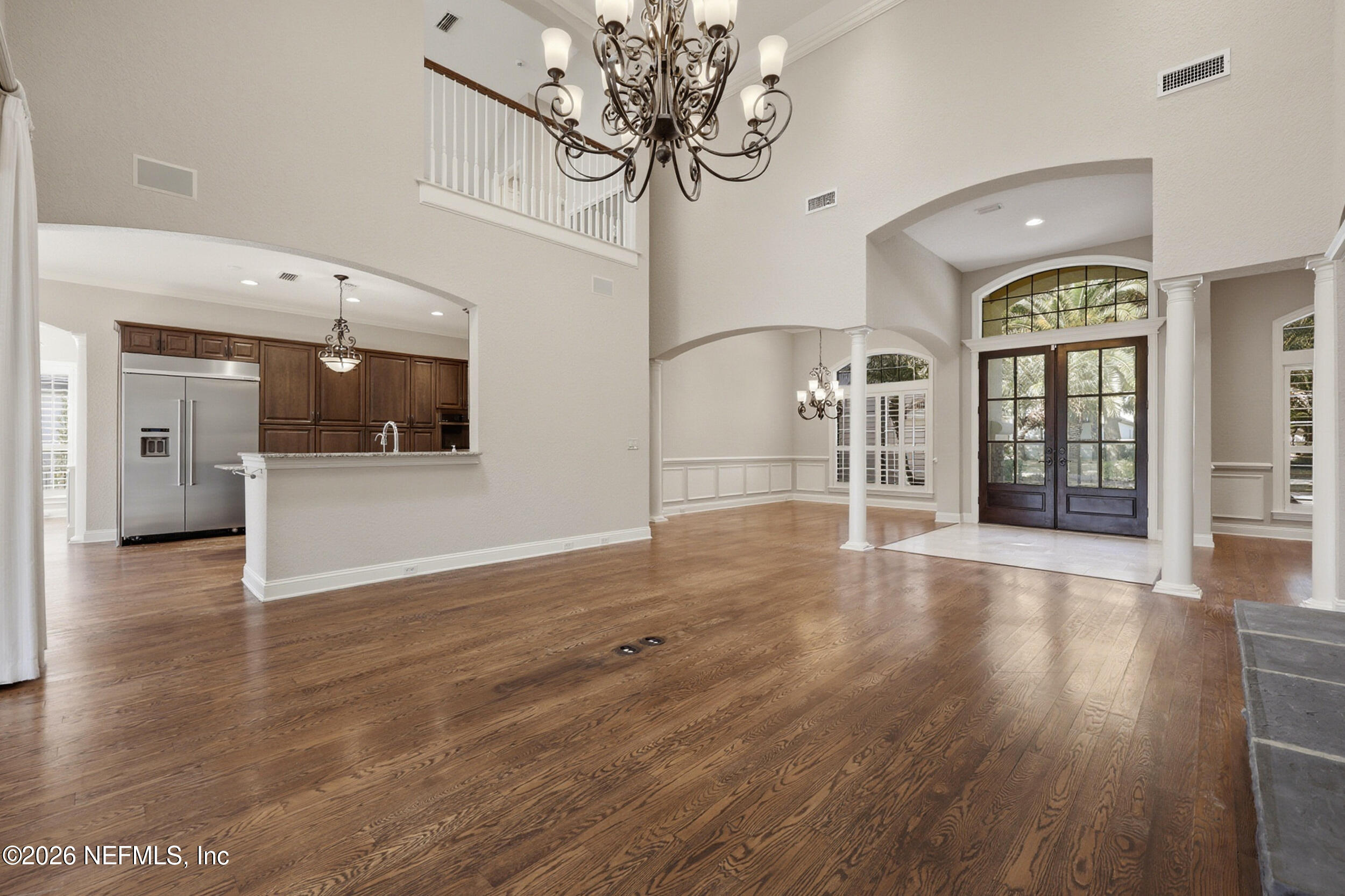 661 Treehouse Circle St. Augustine, FL 32095 - Photo 18 of 89 Family Room into Kitchen
