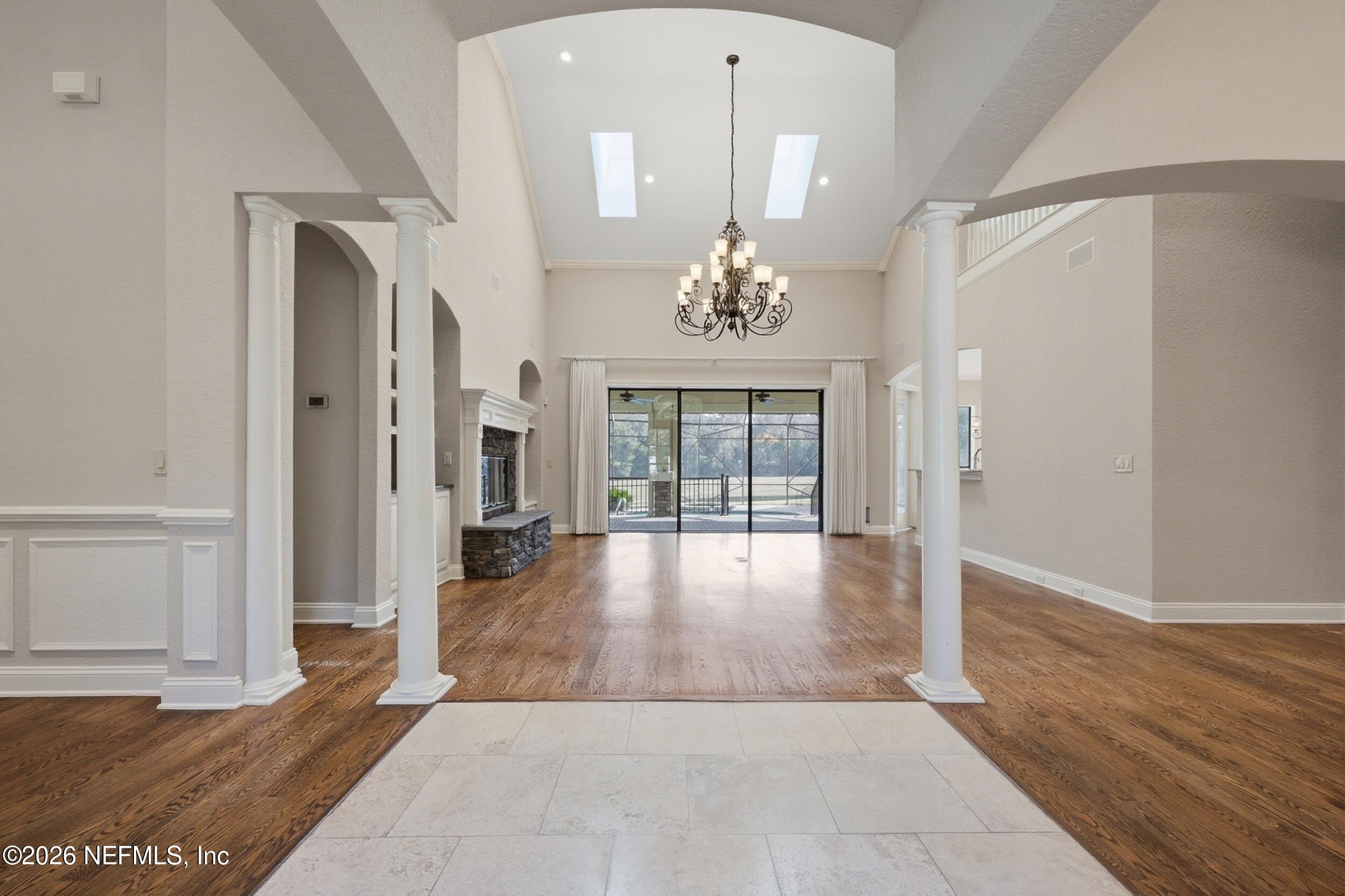661 Treehouse Circle St. Augustine, FL 32095 - Photo 4 of 89 Foyer into Family Room