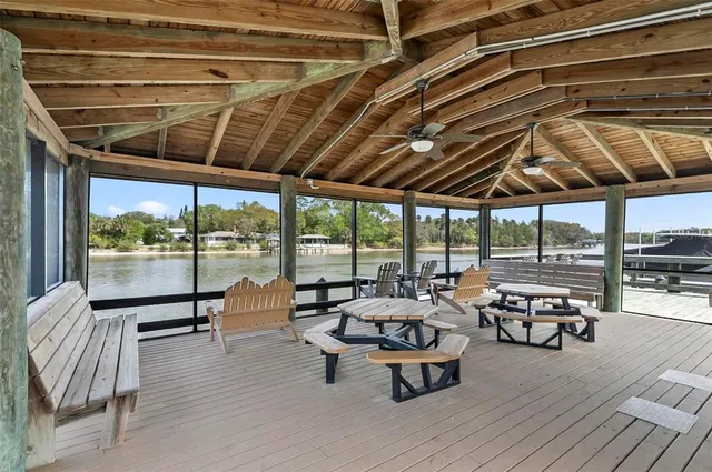 a view of swimming pool is middle in front of house