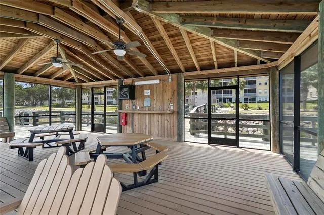 a view of swimming pool with outdoor seating
