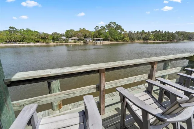 a view of a building with a yard