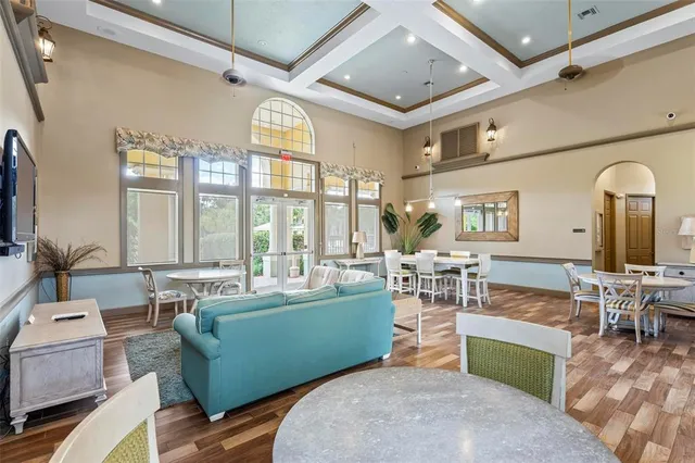 a view of a lake with outdoor seating