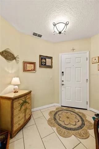 a kitchen with stainless steel appliances kitchen island granite countertop a sink and cabinets