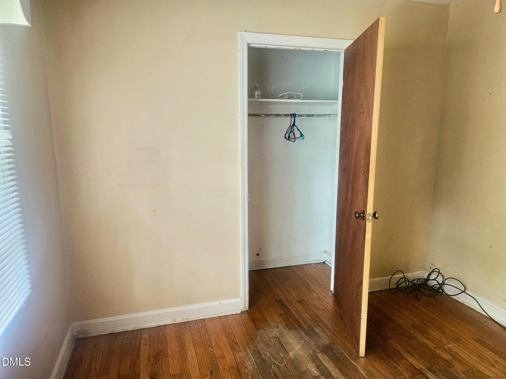 1649 Harper Street Rocky Mount, NC 27801 - Photo 16 of 34 a view of a room with wooden floor and a bathroom