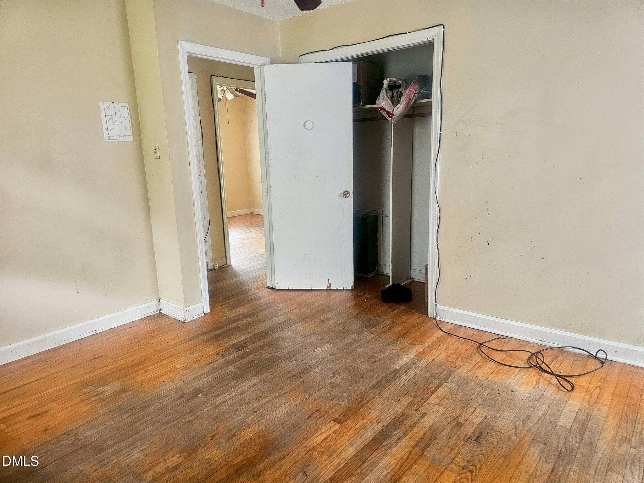 1649 Harper Street Rocky Mount, NC 27801 - Photo 24 of 34 an empty room with wooden floor and closet