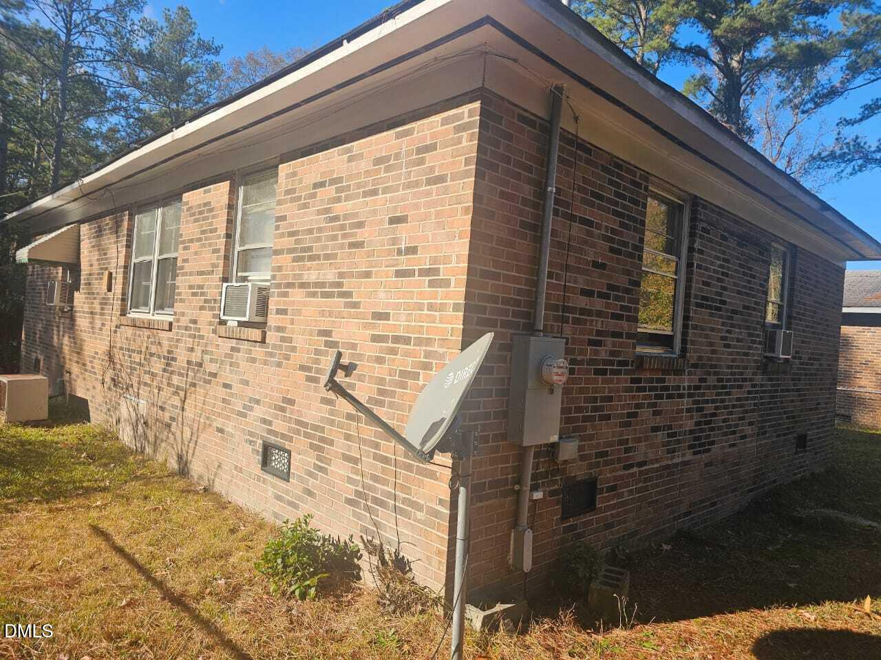 1649 Harper Street Rocky Mount, NC 27801 - Photo 32 of 34 a front view of a house with a yard