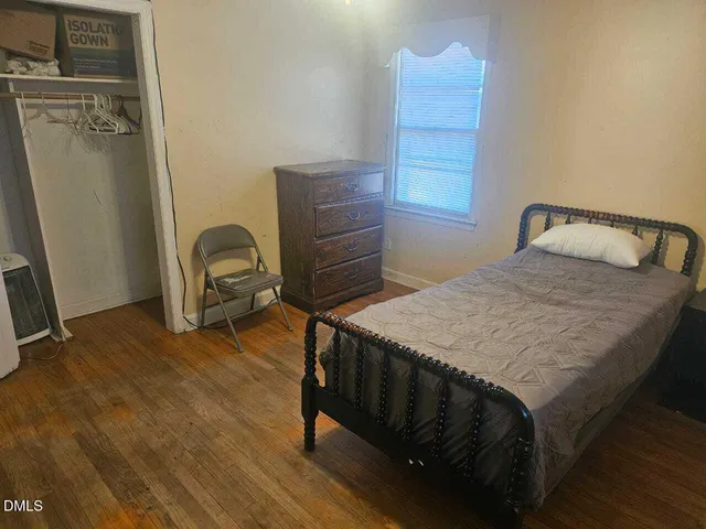 a living room with a couch and a flat screen tv