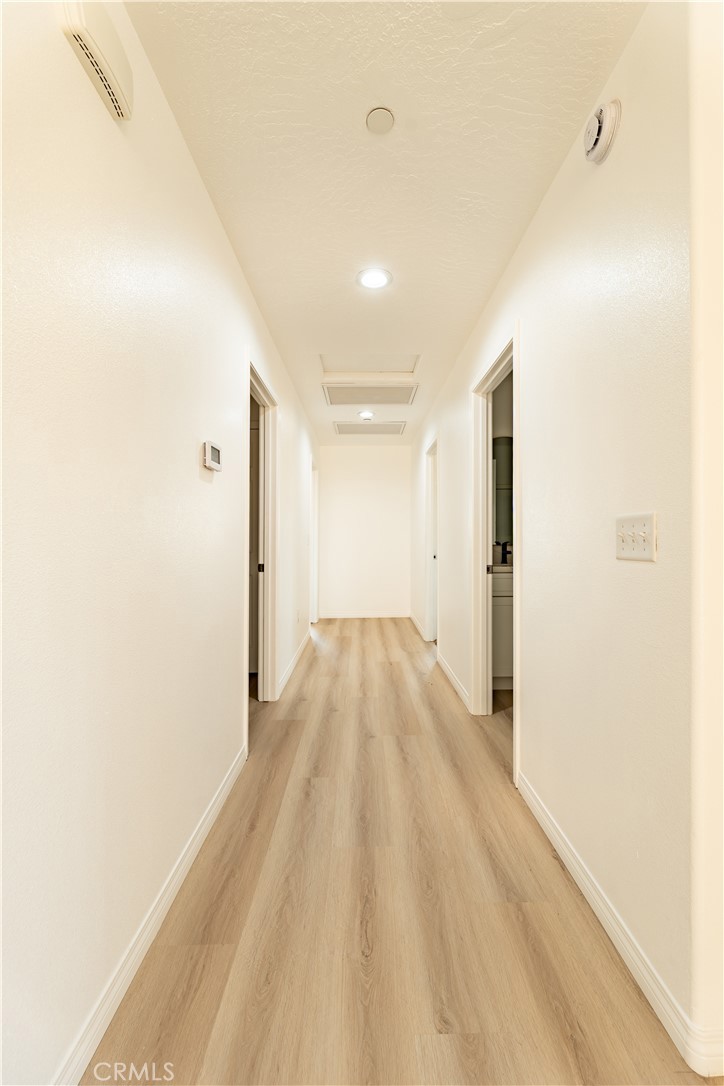 16925 Nanticoke Road Apple Valley, CA 92307 - Photo 41 of 87 a view of hallway with wooden floor
