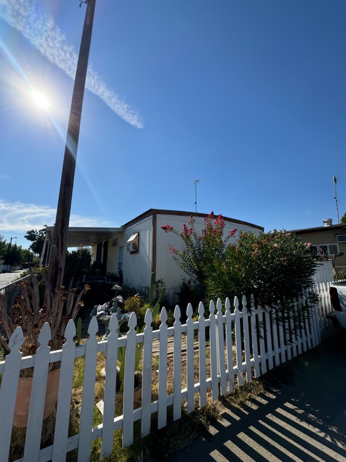 2030 East Grayson Road Ceres, CA 95307 - Photo 1 of 1 a view of a house with wooden fence