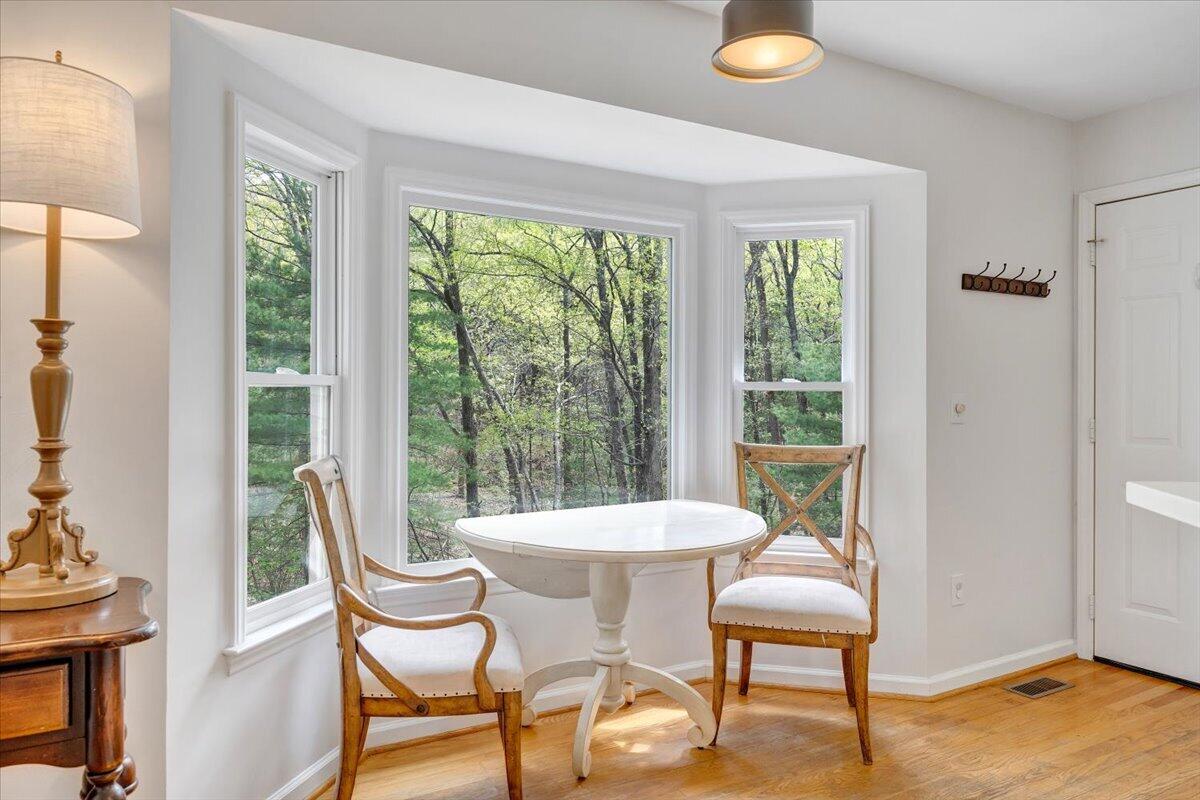 245 Timber Trail Lane Hardy, VA 24101 - Photo 14 of 38 a view of a dining room with furniture and wooden floor