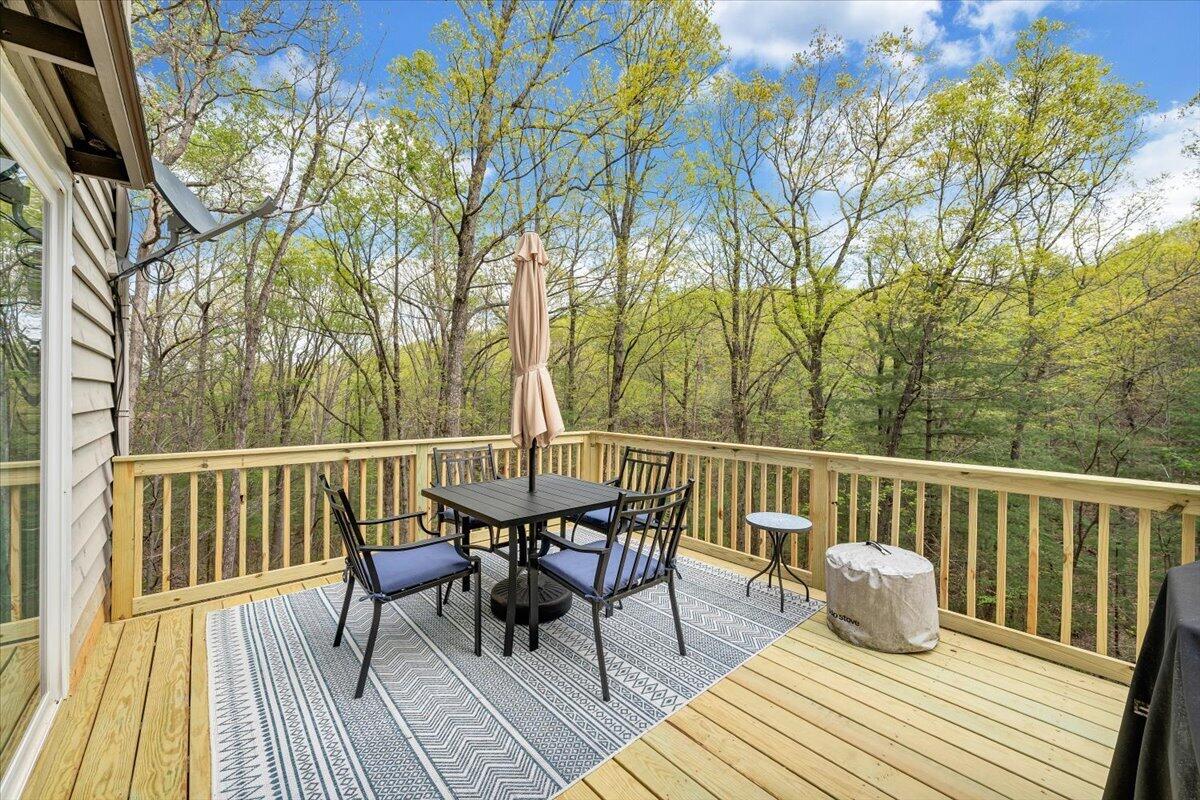 245 Timber Trail Lane Hardy, VA 24101 - Photo 18 of 38 a view of a deck patio and outdoor seating