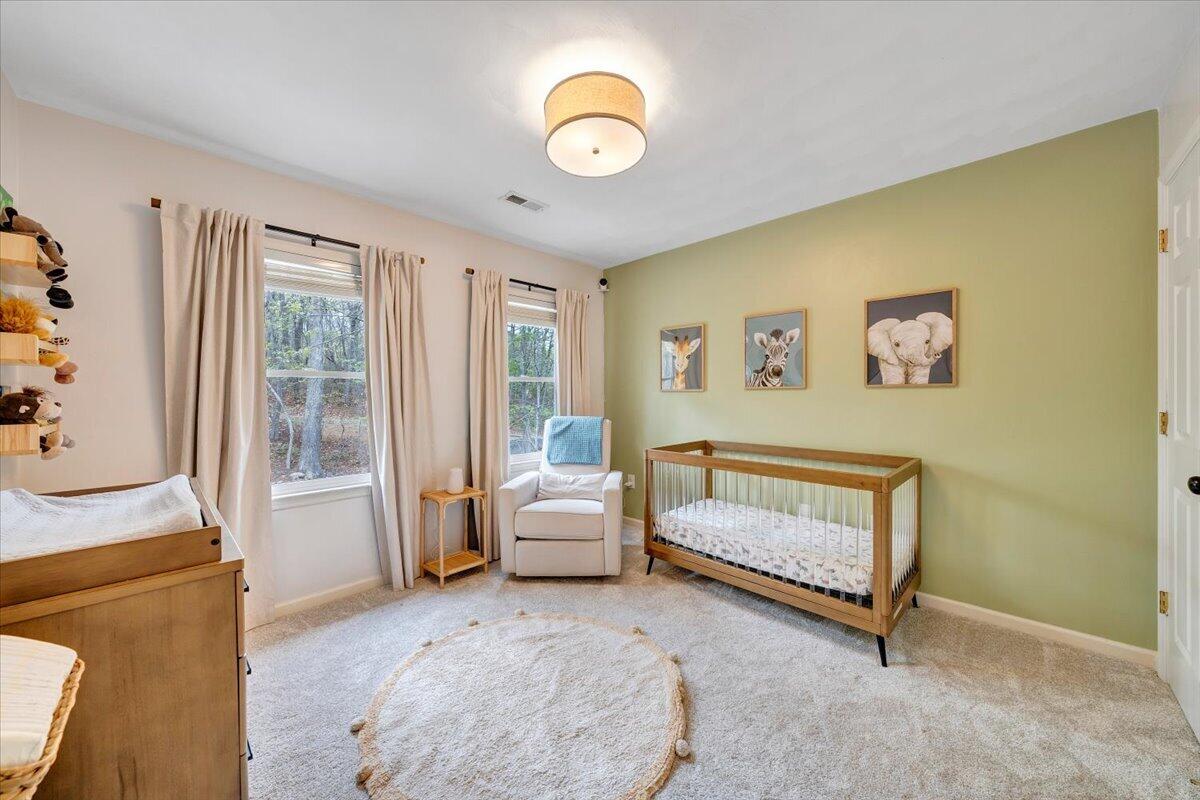 245 Timber Trail Lane Hardy, VA 24101 - Photo 25 of 38 a bedroom with a bed and a couch