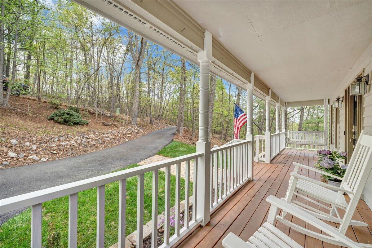 245 Timber Trail Lane Hardy, VA 24101 - Photo 3 of 38 a view of a porch with wooden floor and outdoor space