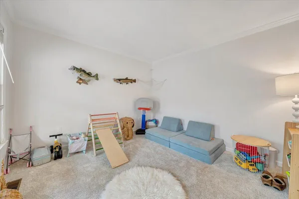 a bedroom with furniture and a couch