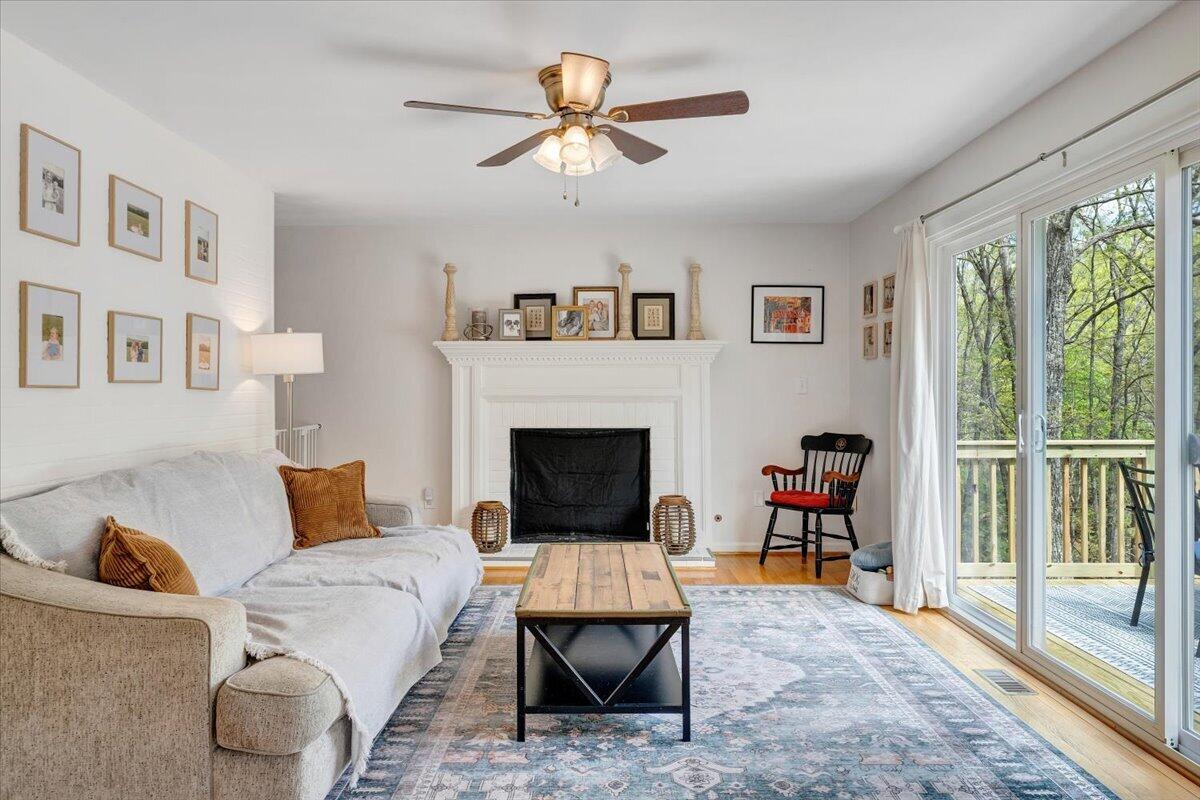 245 Timber Trail Lane Hardy, VA 24101 - Photo 10 of 38 a living room with furniture and a fireplace