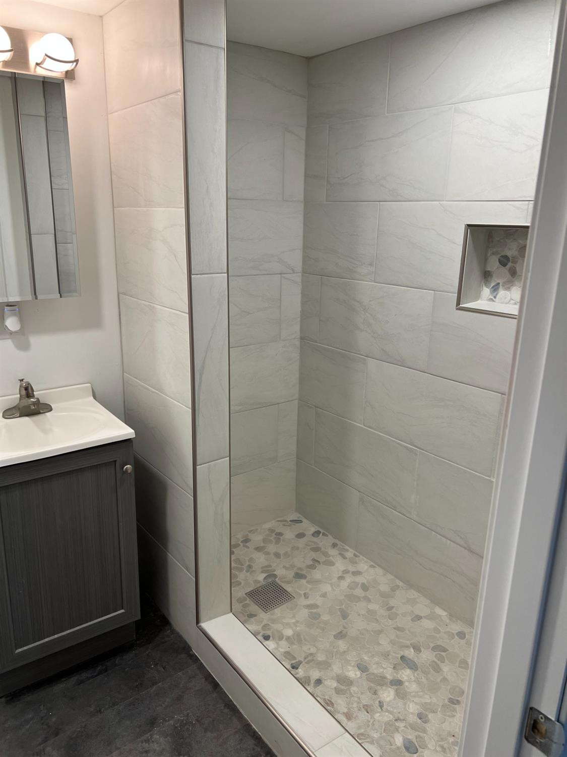 3863 Delaware Street Gary, IN 46409 - Photo 14 of 49 a bathroom with a sink and a mirror