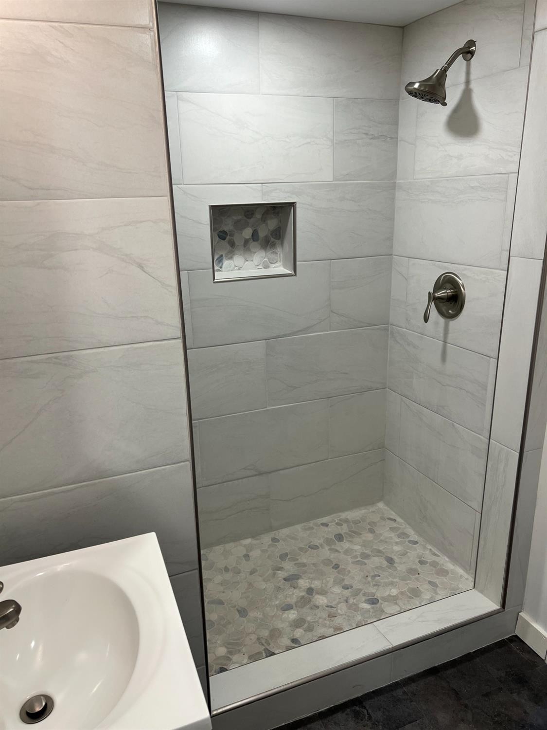 3863 Delaware Street Gary, IN 46409 - Photo 15 of 49 a bathroom with a sink and a shower