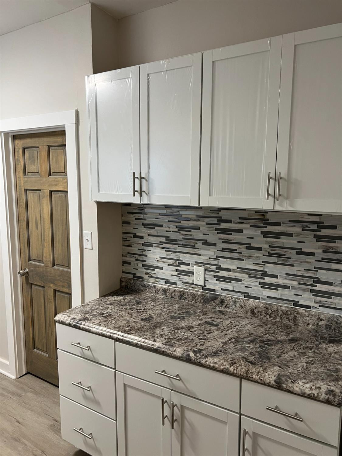 3863 Delaware Street Gary, IN 46409 - Photo 26 of 49 a view of kitchen with granite countertop cabinets