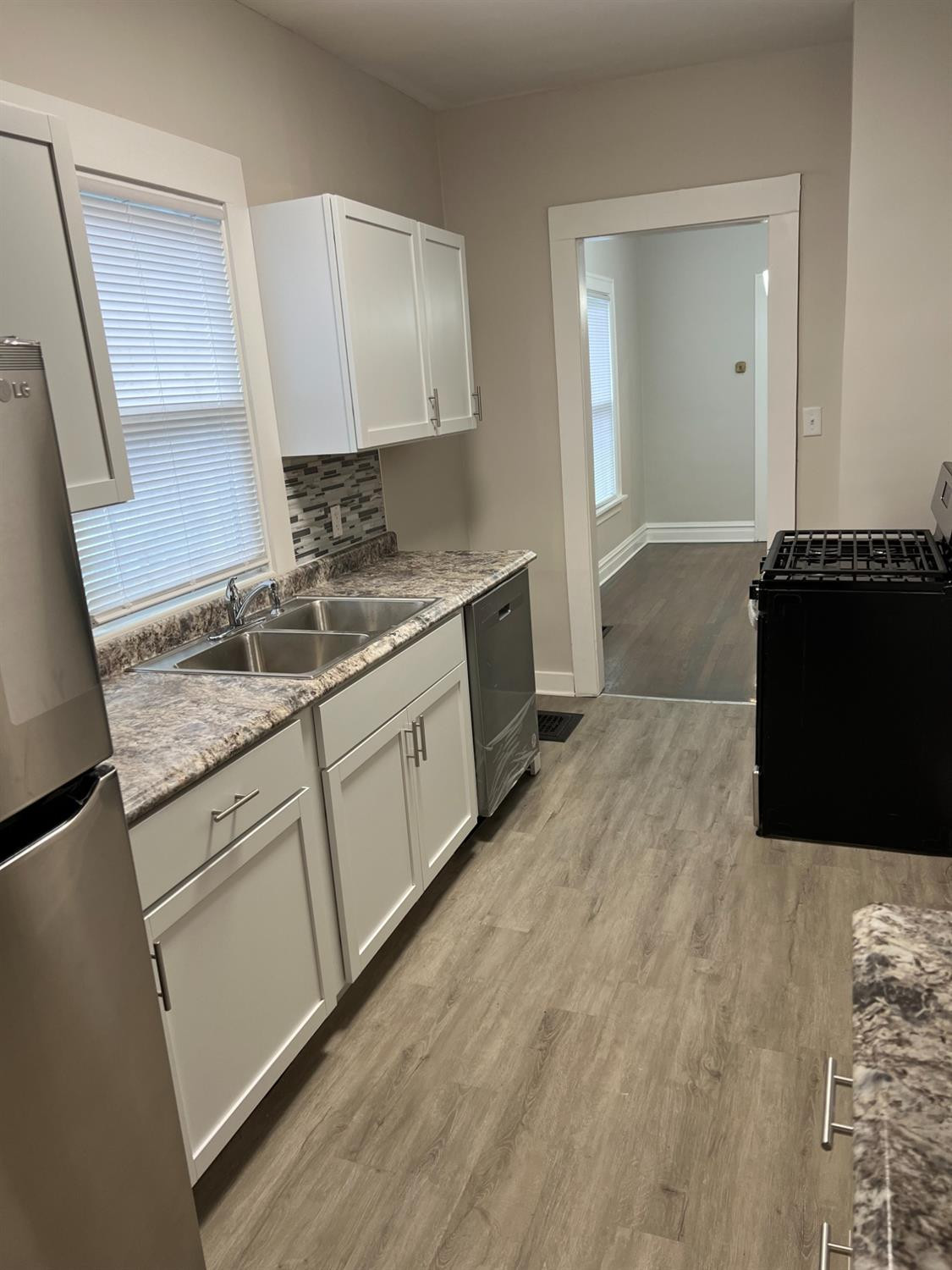 3863 Delaware Street Gary, IN 46409 - Photo 28 of 49 a view of a kitchen counter space and a sink