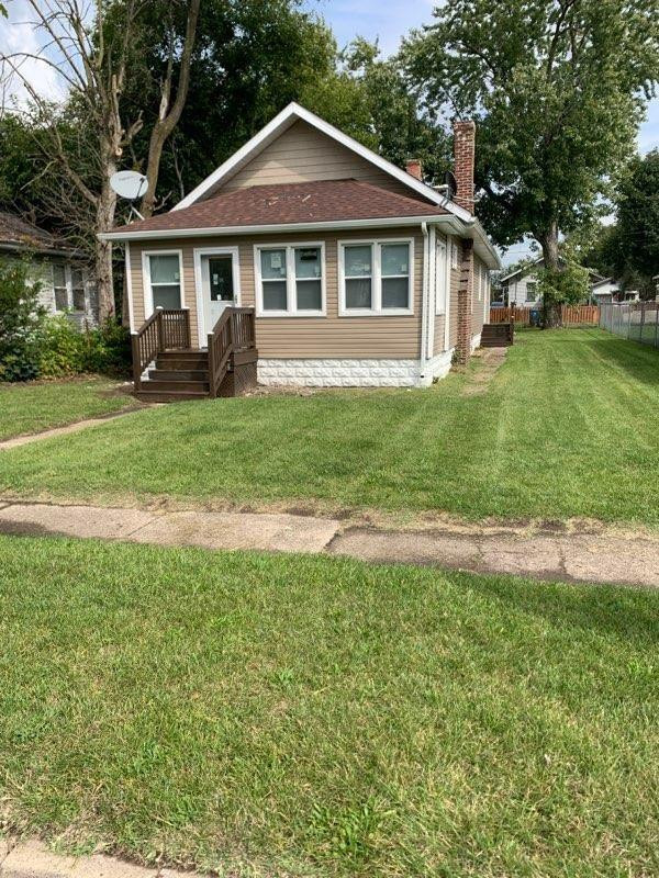3863 Delaware Street Gary, IN 46409 - Photo 3 of 49 a view of a house with a yard
