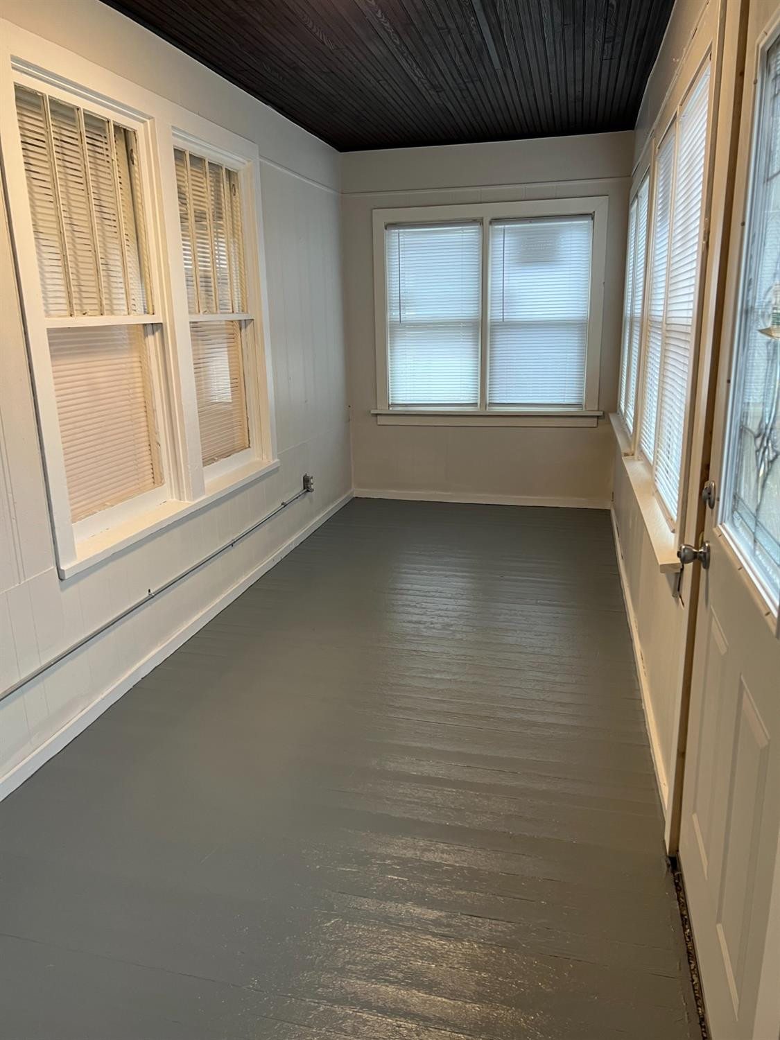 3863 Delaware Street Gary, IN 46409 - Photo 40 of 49 an empty room with wooden floor and windows