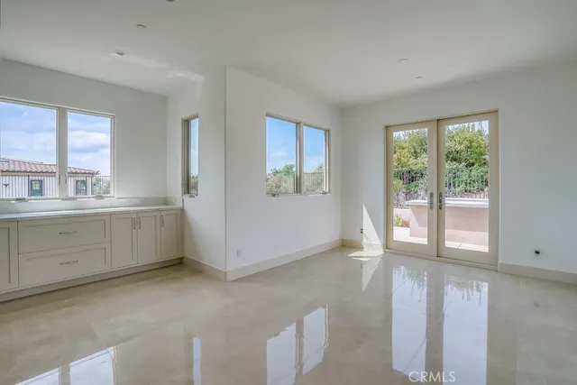 a view of a room with window and cabinet
