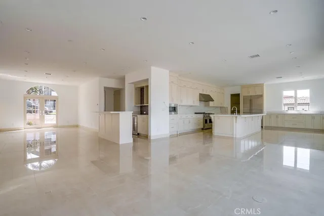 a view of kitchen with furniture and wooden floor
