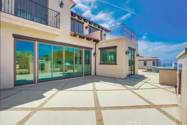 a view of roof deck with furniture