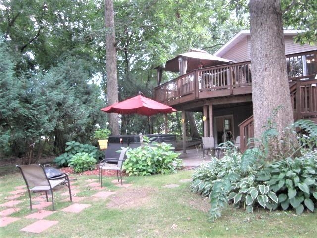 2020 Hillsdown Road Lake Summerset, IL 61019 - Photo 20 of 25 a view of a chair and table in backyard of the house