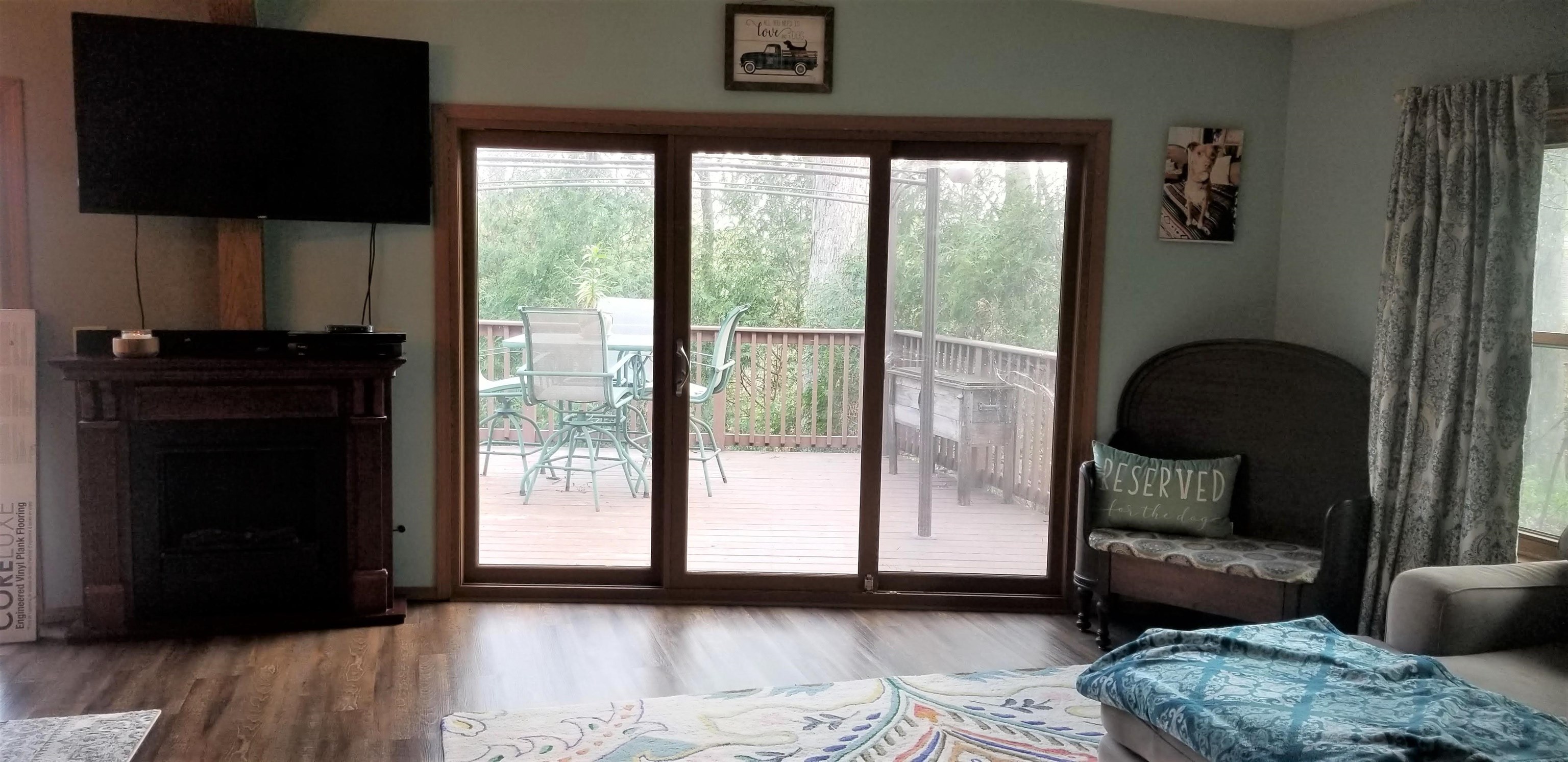 2020 Hillsdown Road Lake Summerset, IL 61019 - Photo 8 of 25 a living room with furniture and a flat screen tv