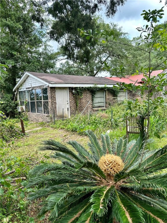 75271 Edwards Road Yulee, FL 32097 - Photo 14 of 21 a front view of a house with a yard