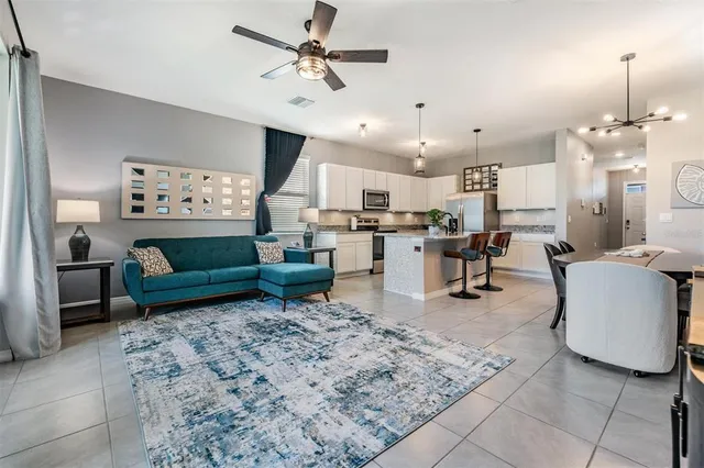 a bedroom with a bed and a tv