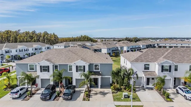 swimming pool view with a painting on the wall