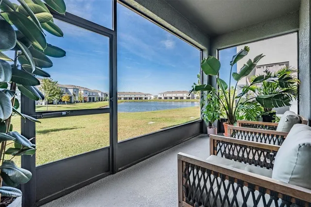 a view of a house with a yard and garage