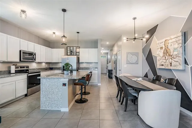 a view of a dining room with furniture