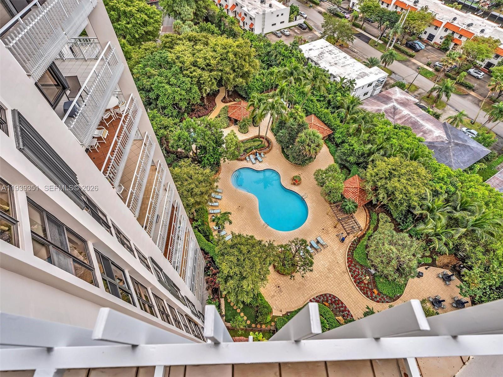 2000 Towerside Terrace, Unit 1806 Miami, FL 33138 - Photo 17 of 58 a view of a house with a backyard