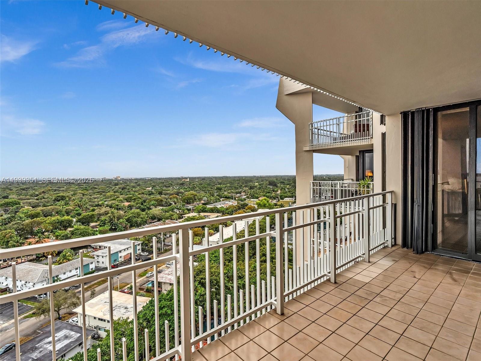2000 Towerside Terrace, Unit 1806 Miami, FL 33138 - Photo 19 of 58 a view of a city from a balcony