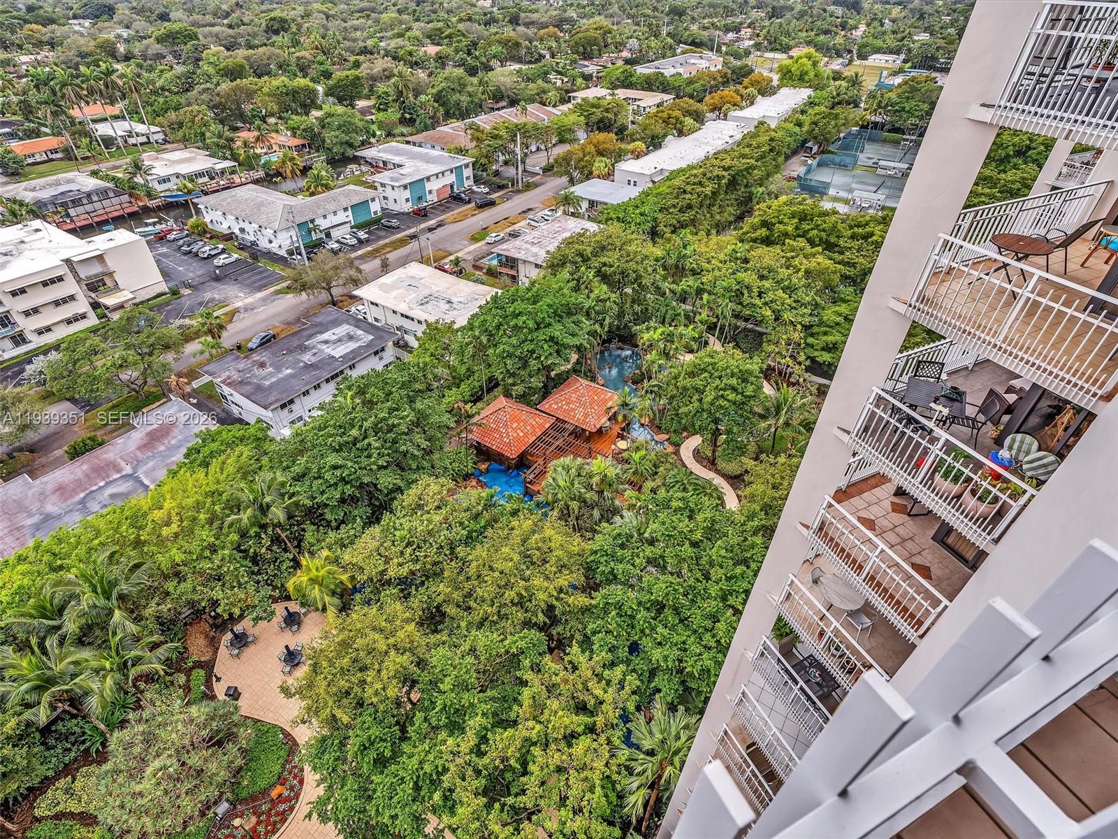 2000 Towerside Terrace, Unit 1806 Miami, FL 33138 - Photo 21 of 58 an aerial view of a house with a yard