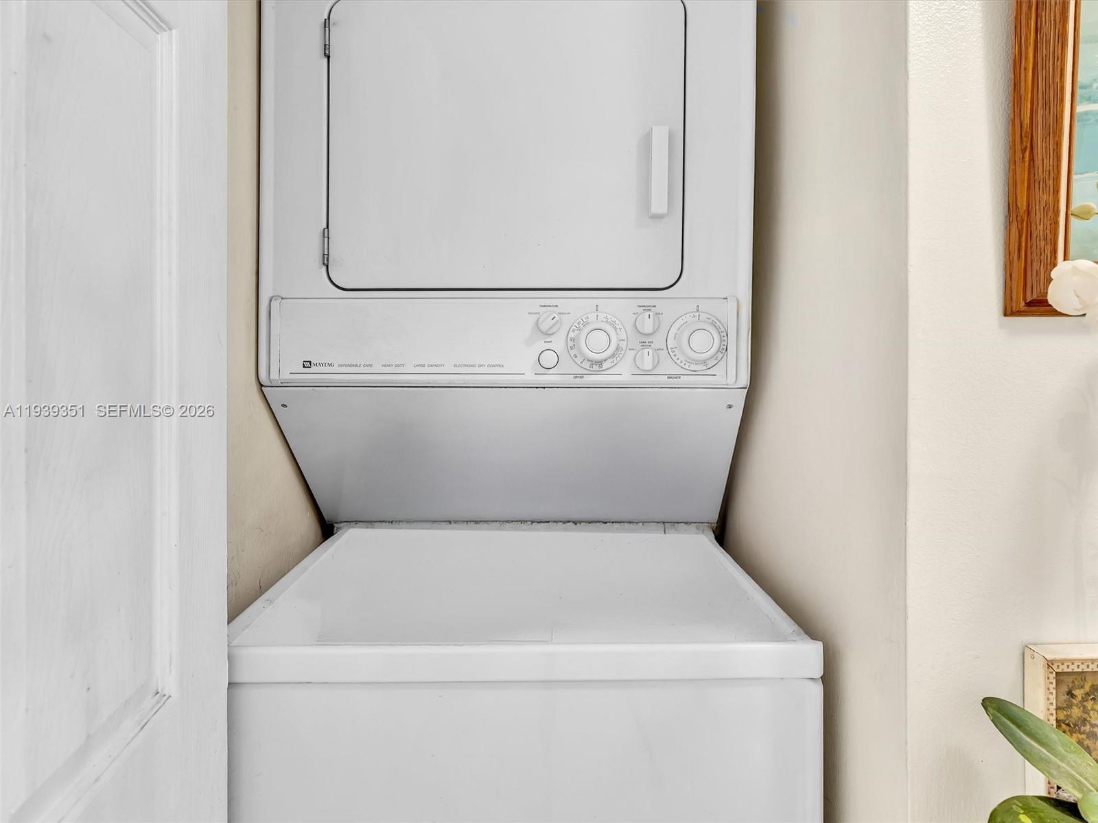 2000 Towerside Terrace, Unit 1806 Miami, FL 33138 - Photo 43 of 58 a utility room with dryer and washer
