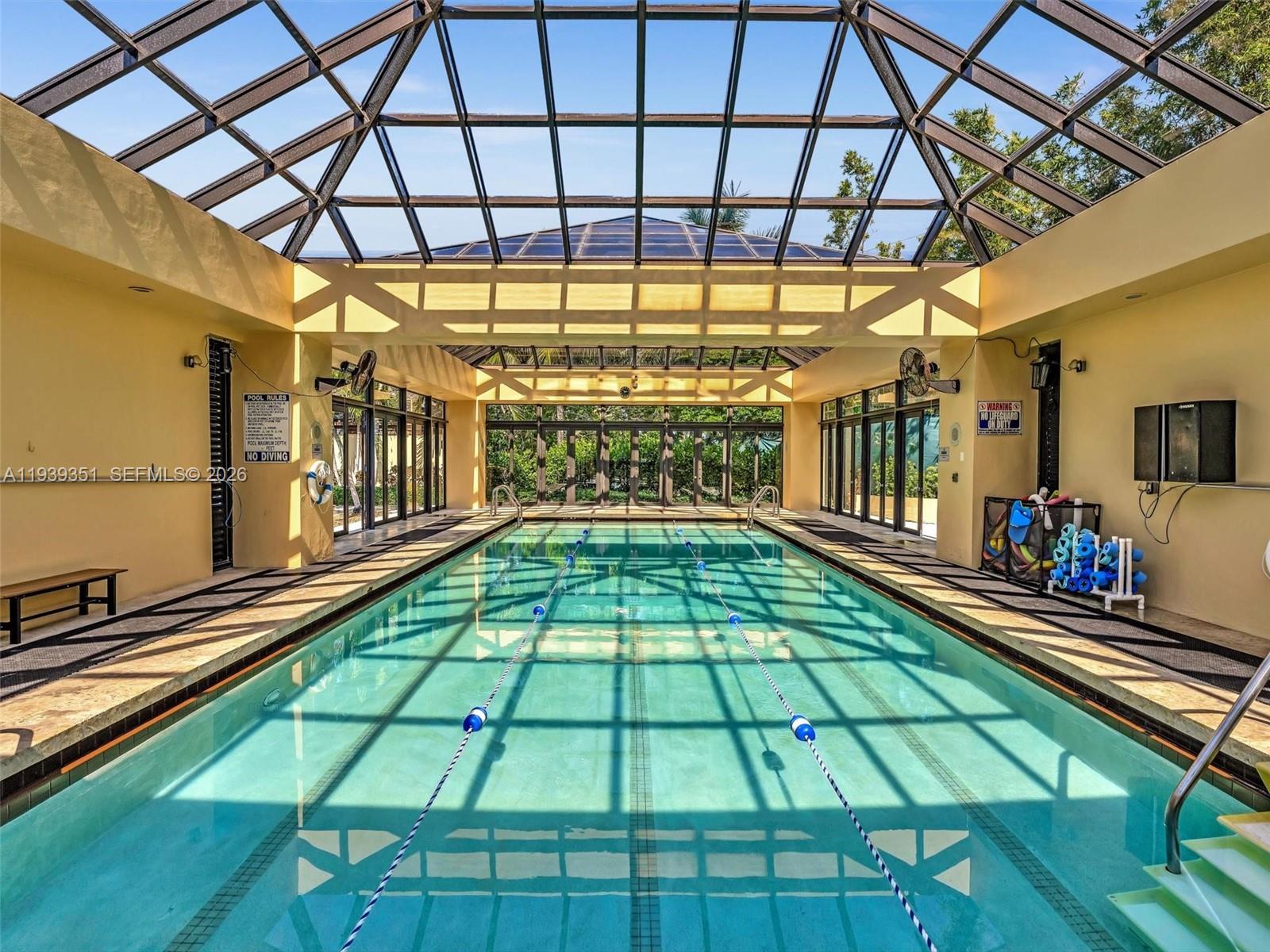 2000 Towerside Terrace, Unit 1806 Miami, FL 33138 - Photo 53 of 58 a view of a indoor swimming pool