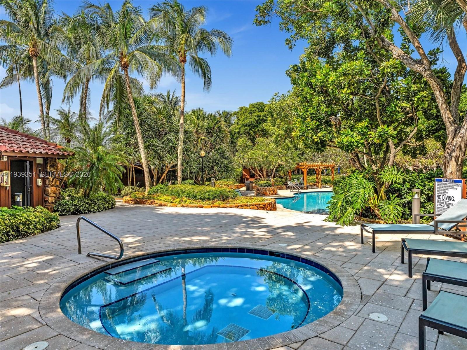2000 Towerside Terrace, Unit 1806 Miami, FL 33138 - Photo 55 of 58 a view of yard with swimming pool