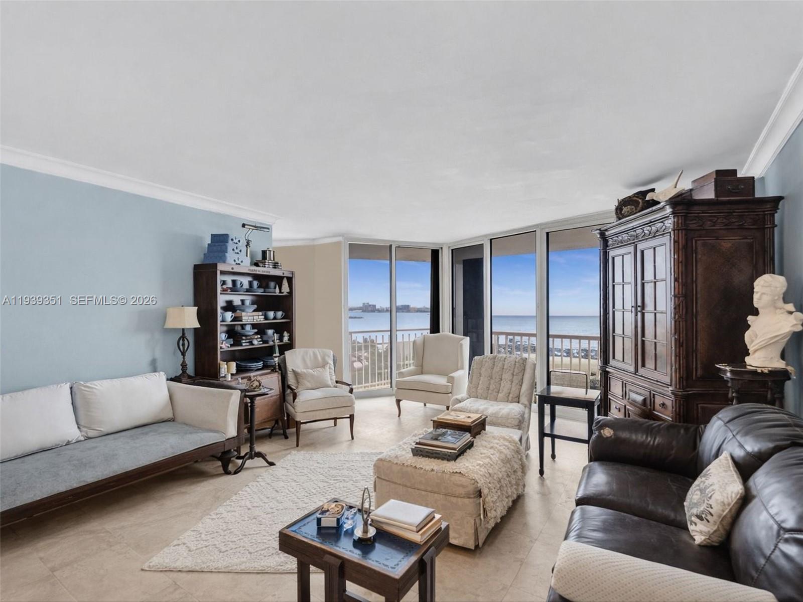 2000 Towerside Terrace, Unit 1806 Miami, FL 33138 - Photo 9 of 58 a living room with furniture and a couch